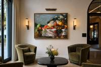 Fruits and Daisies shown in a hotel lobby