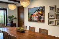 Fruits and Daisies shown in a room setting
