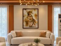 Balinese woman by Paul Dabuco in an elegant family living room