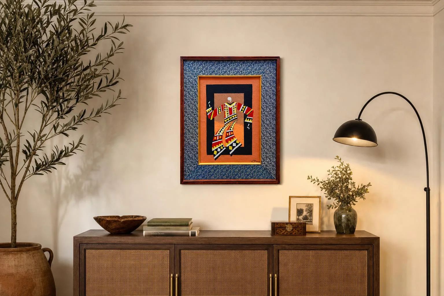 Culture Stick Man #10 2026 by Marvin Gustilo above a console in a cozy traditional home